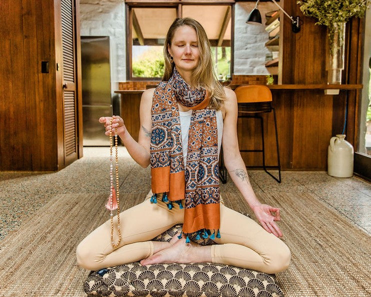 Woman meditation mala beads