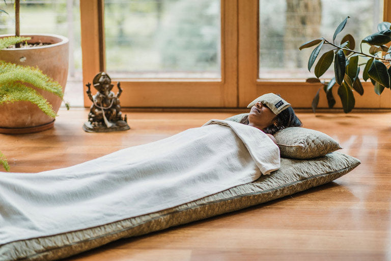 woman in yogic sleep during yoga nidra for anxiety